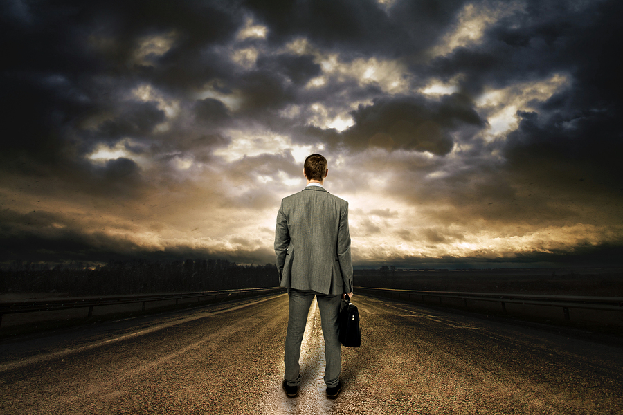 bigstock-Business-man-standing-in-the-m-38944402