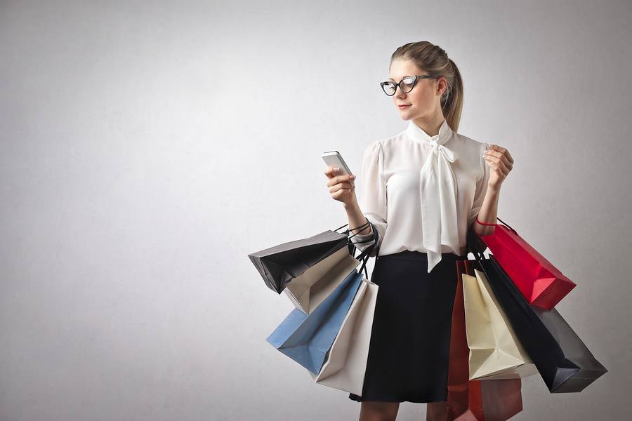 beautiful young woman goes shopping