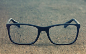 Glasses on a wood desk