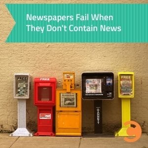Different newspaper stands and dispensers
